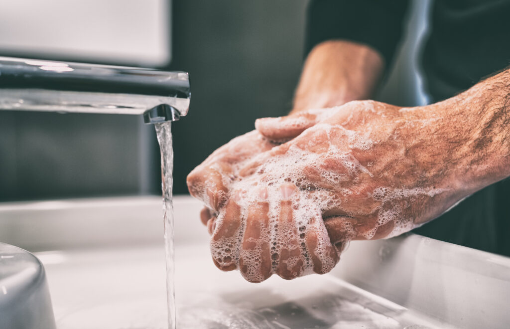 WAshing hands with soap and water